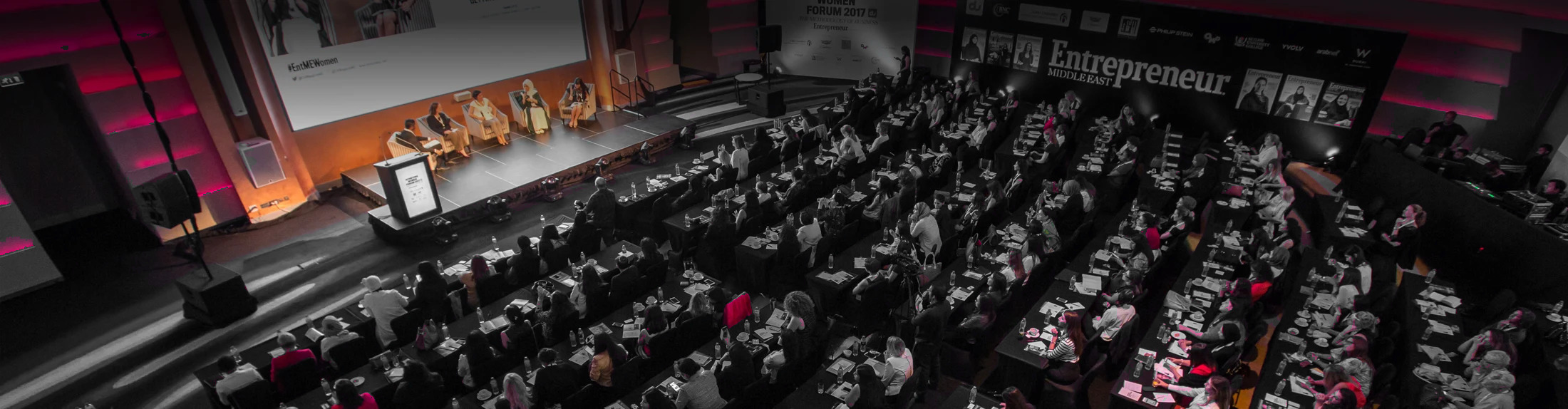 Audience and speakers at a BNC event